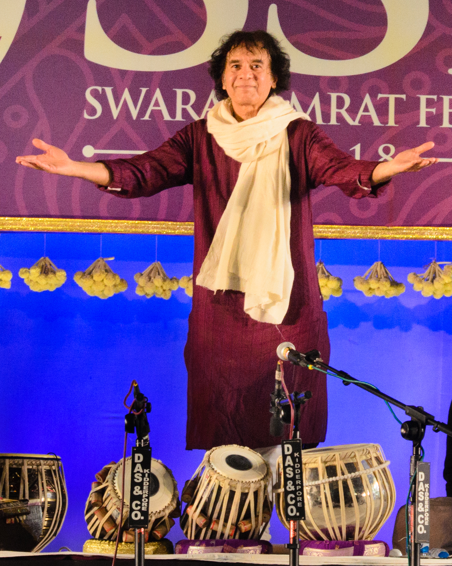 Zakir Hussain greeting the audience at the Swara Samrat Festival.