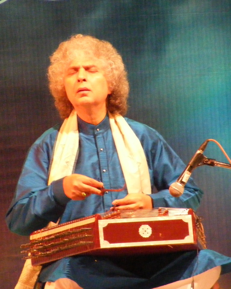 Shivkumar Sharma in performance, the santoor resting across his lap.