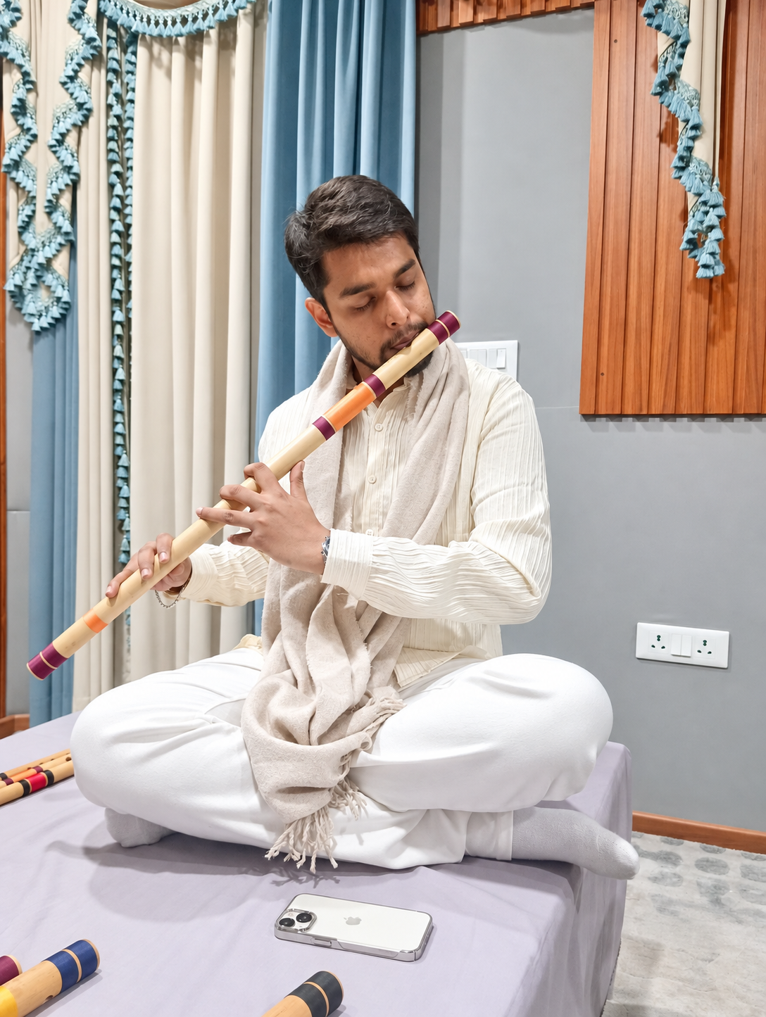 Deekshant Malvi playing the bansuri.