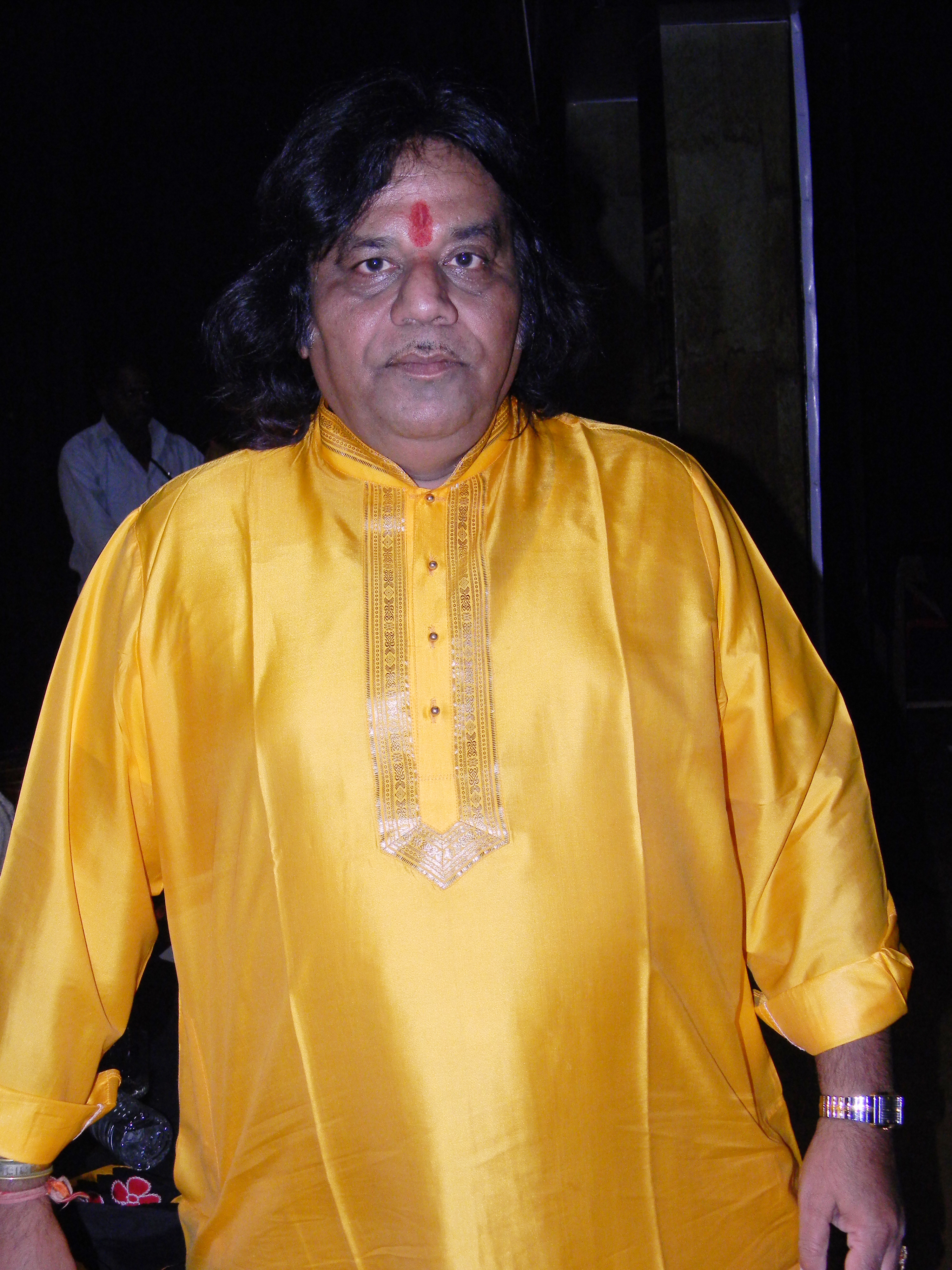 Portrait of pakhawaj player Bhavani Shankar.