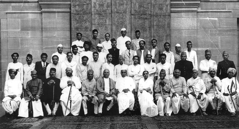 Large group photograph of Indian musicians seated and standing in rows, 1948.